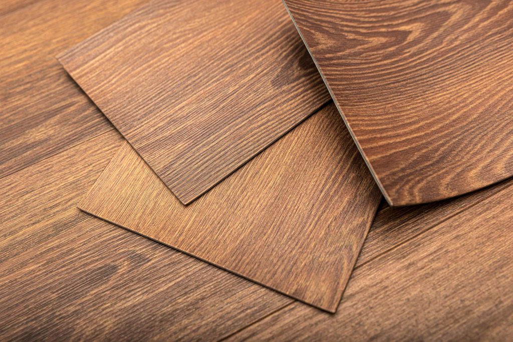 Elegant wooden flooring samples highlighting various wood types, part of a luxury flooring service in Jacksonville, FL.