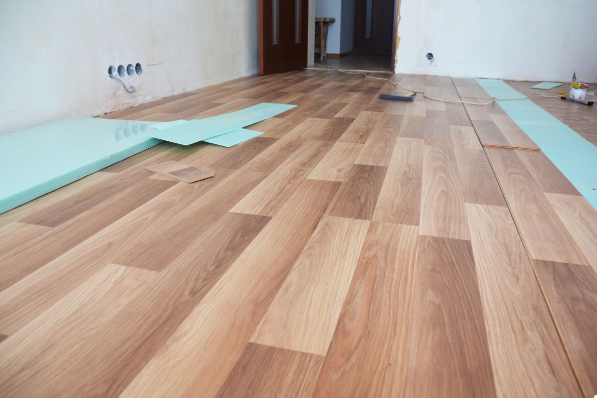 A cozy room featuring warm wood floors and elegant hardwood accents, creating a welcoming atmosphere.